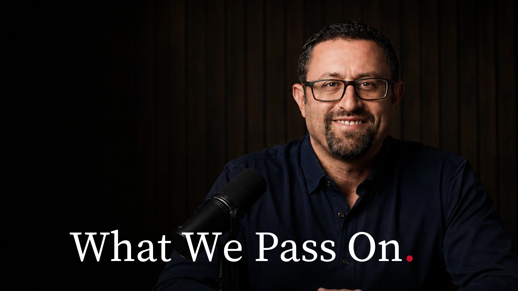 Adam Fridman, host of What We Pass On, at the advisor.TV studio table.